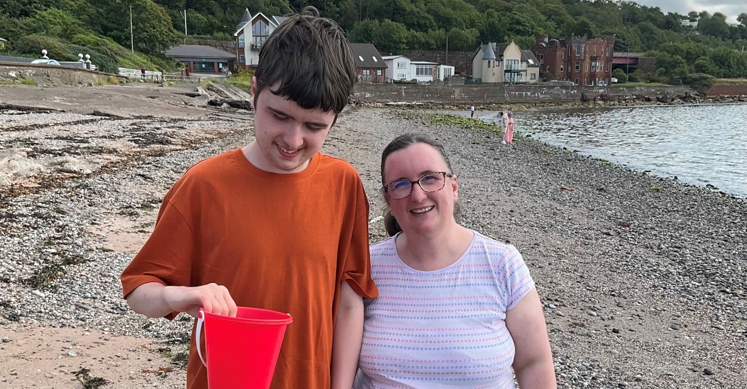 A mother and her son at the beach