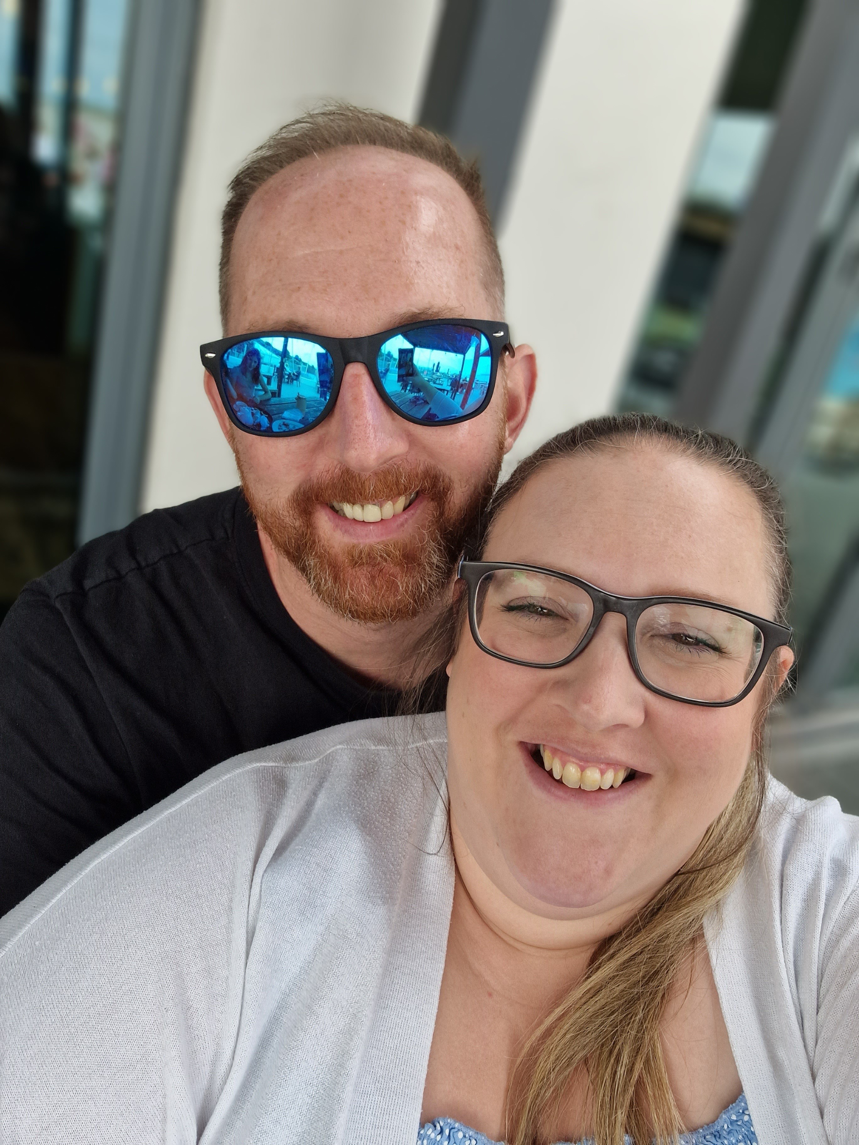 A happy couple take a selfie