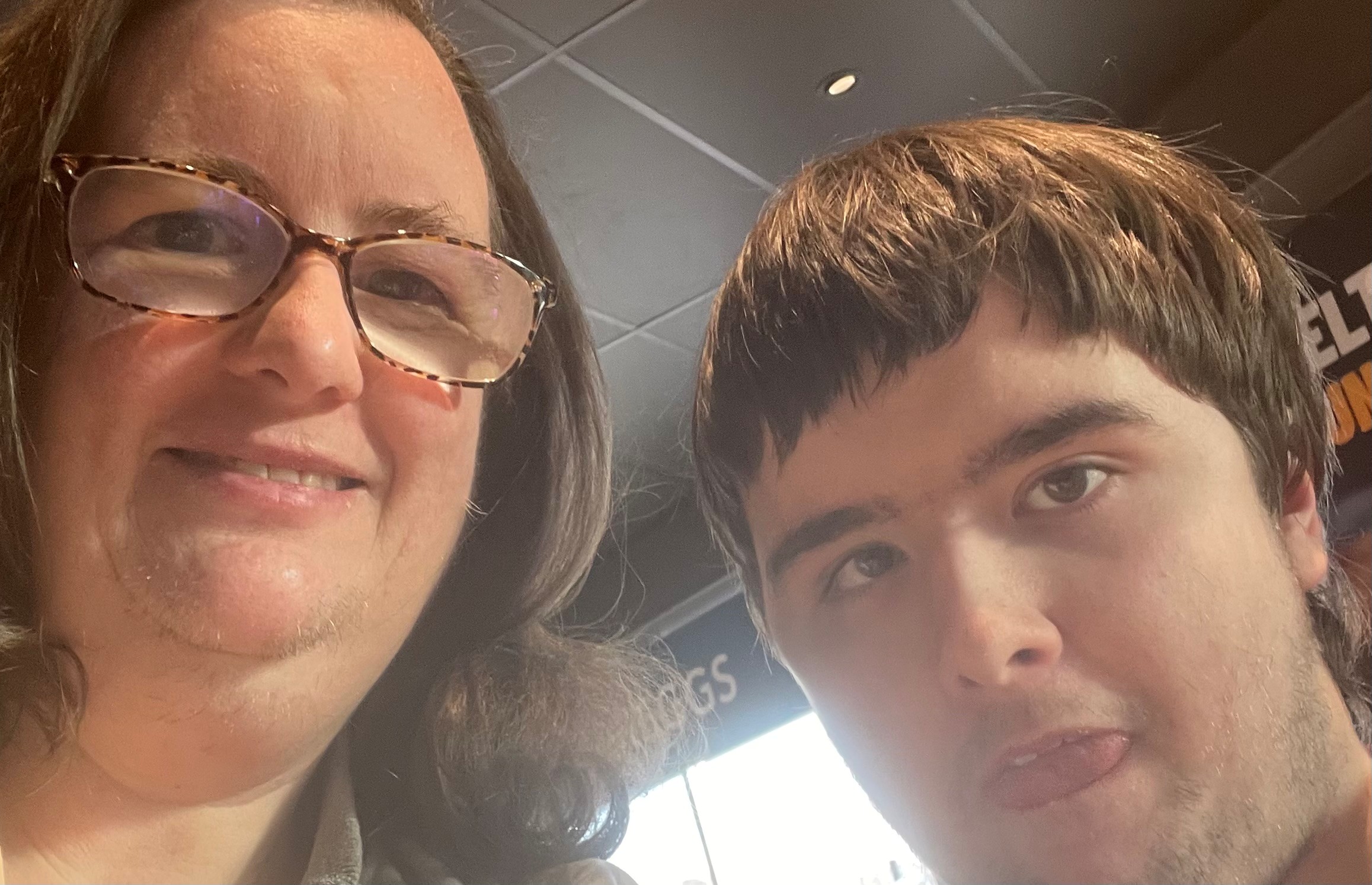 Mother and son posing for the camera