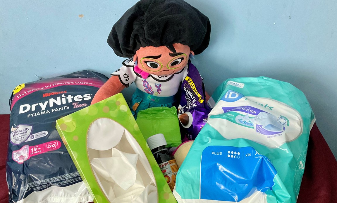 Periods in an incontinent disabled teen