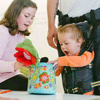 Child using Upsee to play on table